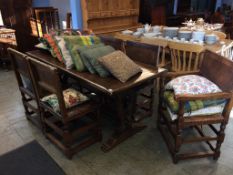 An oak refectory table and six chairs