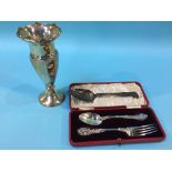 A silver spill vase and a silver spoon etc.