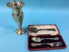 A silver spill vase and a silver spoon etc.