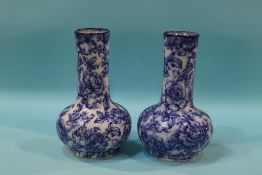 A pair of blue and white Losol ware vases, 18cm height