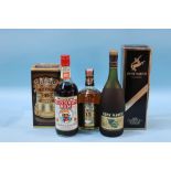 A bottle of Wood's 'Old Navy' rum, a bottle of Old Royal Scotch whiskey and Remy Martin Fine
