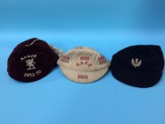 Three vintage school caps