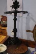 A cast iron stick stand