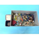 A box of costume jewellery, to include a Victorian meritorious service medal etc.