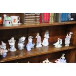 Two Lladro clowns, Lladro duck group and five Nao figures (8)