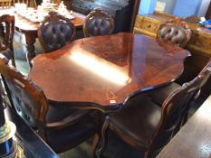 An Italian style dining table and six chairs