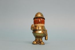 A John Hassall brass and ceramic policeman car mascot, circa 1910, signed on the waist, 11cm tall