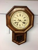 A walnut cased octagonal wall clock, by Ansonia Clock Company, New York