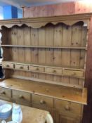 A pine kitchen dresser, 152cm wide, 188cm high, 44cm deep