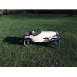 An early painted and wood fabricated metal Daimler Sports pedal car by Lines Brothers, cream