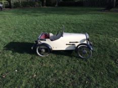 An early painted and wood fabricated metal Daimler Sports pedal car by Lines Brothers, cream