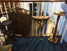 A plant pedestal, fire screen, Cake stand and half moon cast iron table