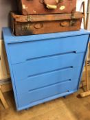 A blue painted chest of drawers