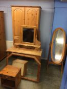 A pine wardrobe, two mirrors, a cheval mirror, bedside chest etc.