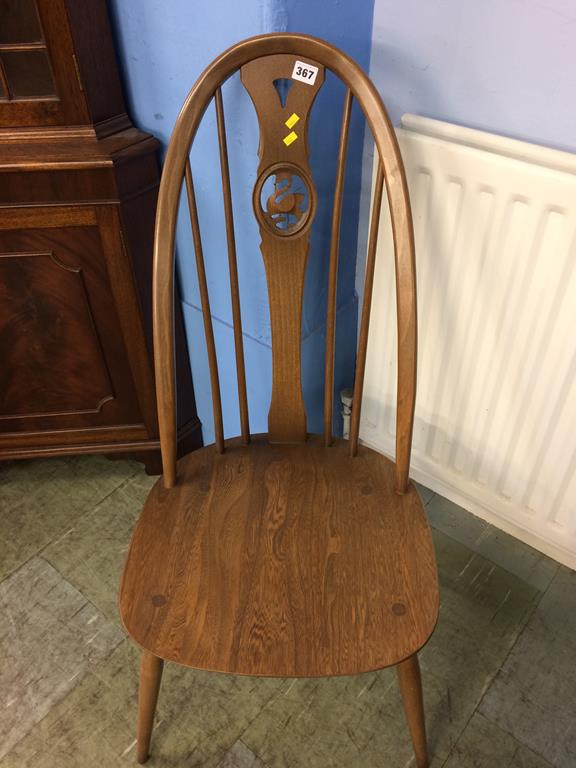 An Ercol hoop back chair