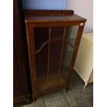 A walnut china cabinet