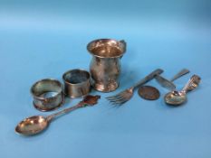 A silver tankard and napkin rings etc.