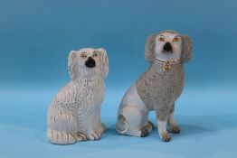 A Staffordshire Frit dog and a Staffordshire Spaniel