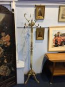 An onyx and brass coat stand