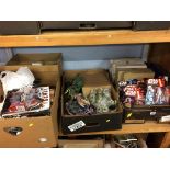 Four boxes of toys and figures