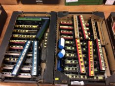 Two trays of Hornby model railway carriages