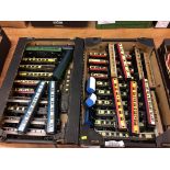 Two trays of Hornby model railway carriages