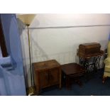 A lamp, sewing machine and nest of tables etc.