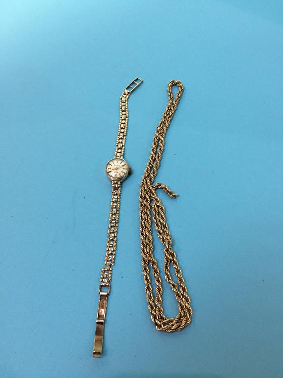 A 9ct gold Ladies watch and an un-marked gold coloured chain, total weight 10.3g including 9ct