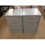 Two metal filing cabinets