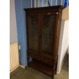 An oak glazed bookcase, 93cm width x 173cm height