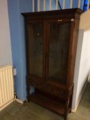 An oak glazed bookcase, 93cm width x 173cm height