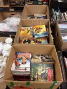 A collection of Commando comics, in three boxes