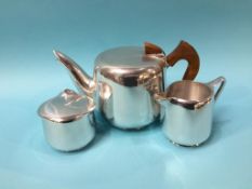 A three piece Picquot ware tea set