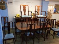 A matched sixteen piece mahogany dining room suite