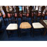 A pair of inlaid Edwardian chairs and one other (3)