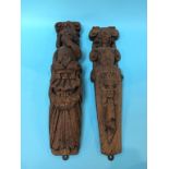 A pair of carved wood relief corbels, 41cm length