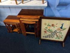 Two nest of tables and a fire screen