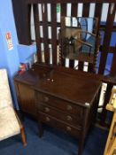 An oak dressing chest and a bedside cabinet