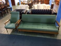 A Guy Rogers 'Manhattan' sofa bed and reclining armchair