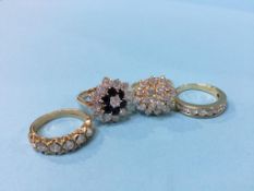 Four gold dress rings, stamped ‘375’, total weight 16g