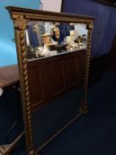 A gilt overmantel mirror, 108cm x 124cm