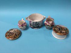 A 19th century pink lustre Eel jar, two small lustre cream jugs and two pot lids