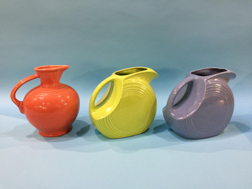 A collection of 11 'Fiesta' jugs