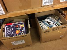 Four boxes of assorted books etc.