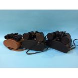 Three pairs of binoculars