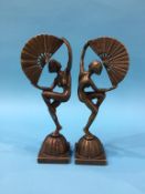 A pair of Art Deco style nude ballerina figures holding fans, 25cm height