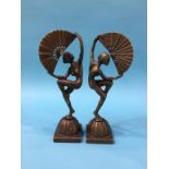 A pair of Art Deco style nude ballerina figures holding fans, 25cm height