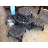 A tyre table and five stools