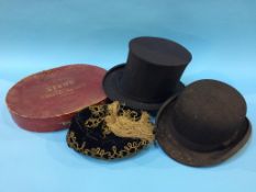 A Collapsible top hat and a bowler hat etc.