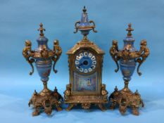 A reproduction clock and garniture